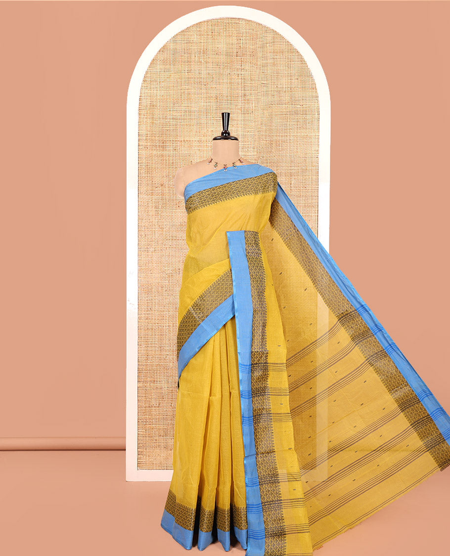 Yellow Bengal Cotton Saree, Subtly Woven with Thread Buttas All Over Its Body, Complemented by a Contrast Border of Temple and Jaal Designs, Pallu of Stripes and Buttas, and Comes Without a Blouse
