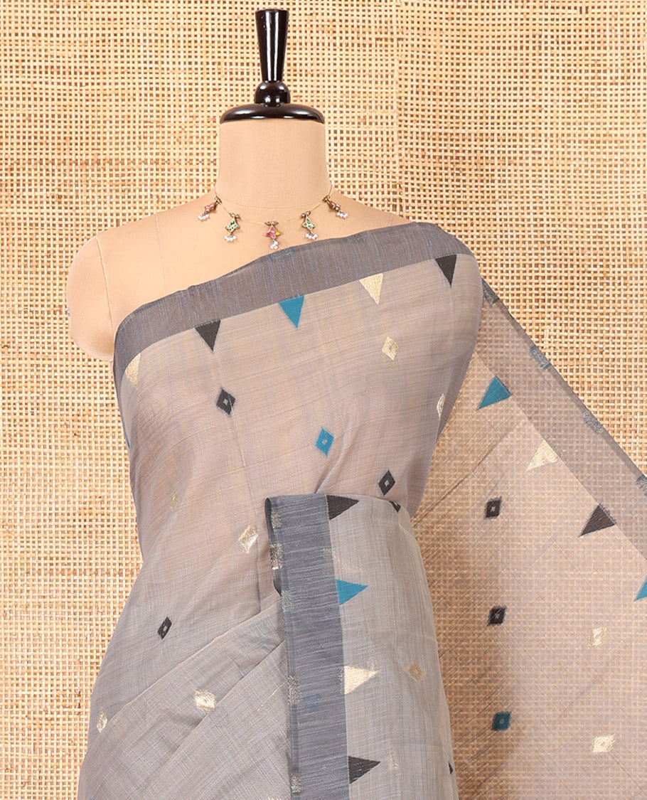 Grey Jute Cotton Saree, Adorned with Diamond Meena Buttas All Over Its Body, Complemented by a Contrast Border, Pallu of Jamdhani-Style Floral Designs, and Paired with a Contrast Blouse