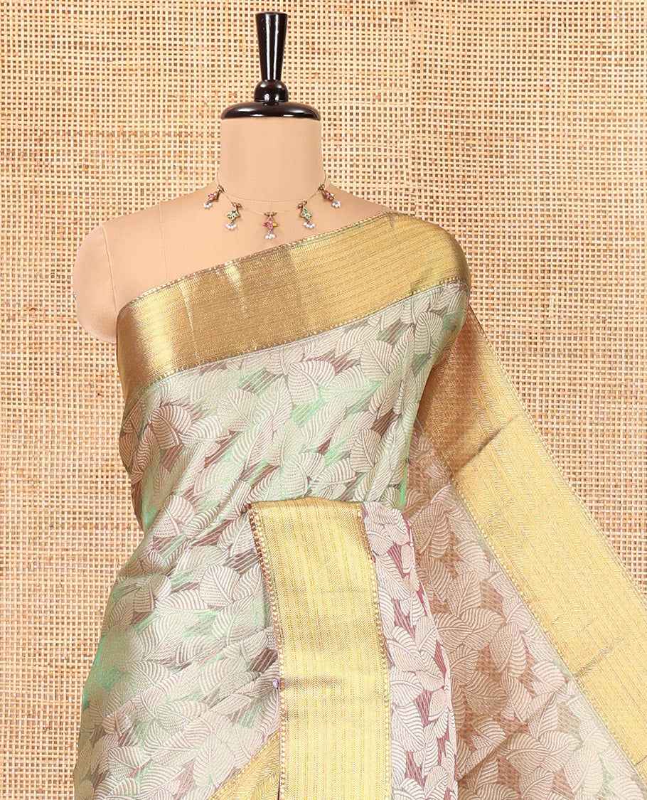 Green Tissue Saree, Gleamed Up with Leaf Jacquard Design, Zari Traditional Border, a Self-Pallu, and a Matching Blouse