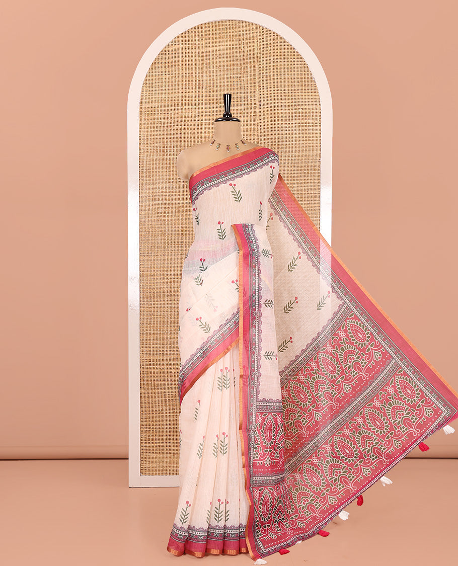 Cream-Pink Linen Cotton Saree Features Floral Buttas, Contrast Printed Border, Intricate Pallu, and a Contrast Blouse