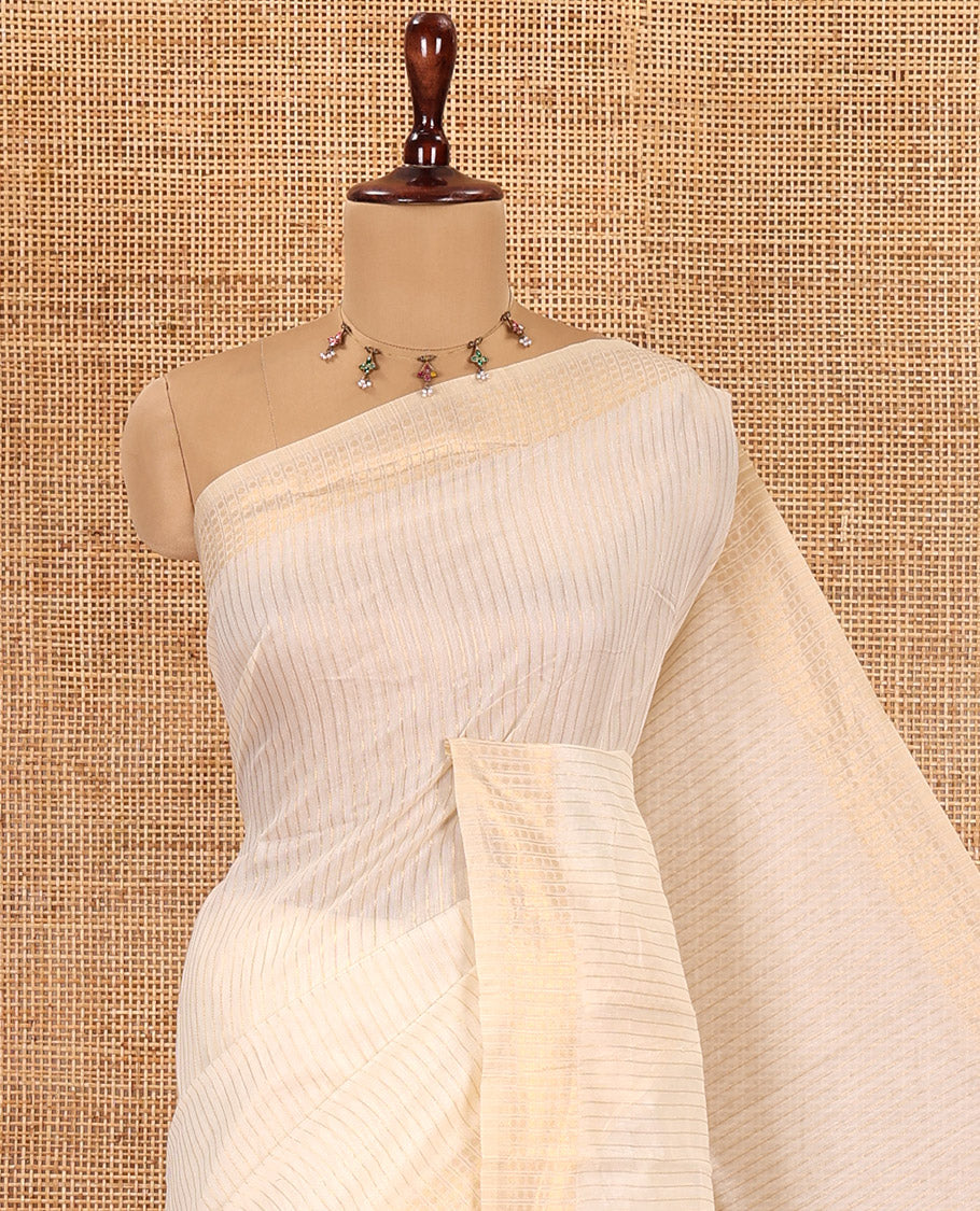 Cream Chanderi Cotton Saree Features Vertical Stripes, a Rudraksha Border, Zari Pallu, a Matching Blouse