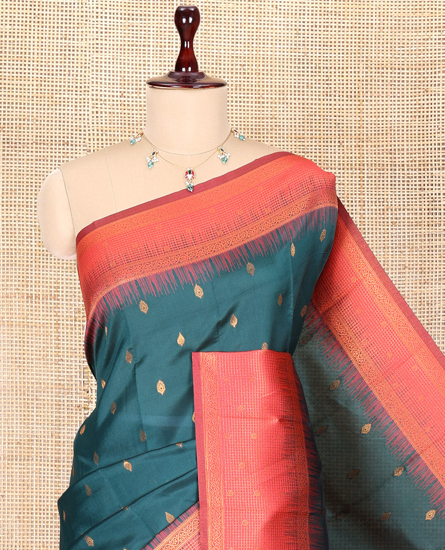 Green Art Kanchi Silk Saree, Adorned with Buttas, a Contrast Traditional Zari Border, Intricate Pallu, and a Contrast Blouse