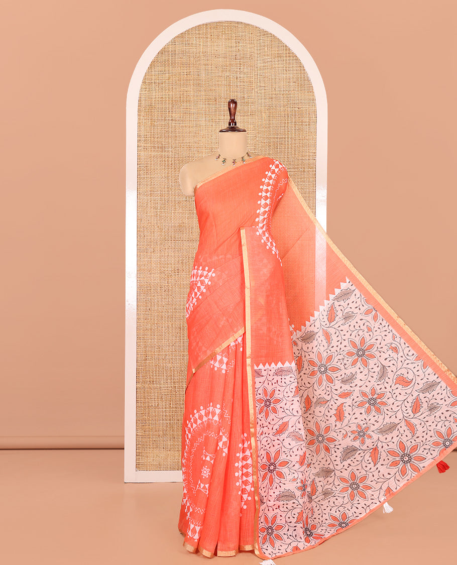 Fanta Orange Linen Cotton Saree Features Warli Print, a Contrast Piping Border, a Floral-Printed Pallu, and a Contrast Blouse