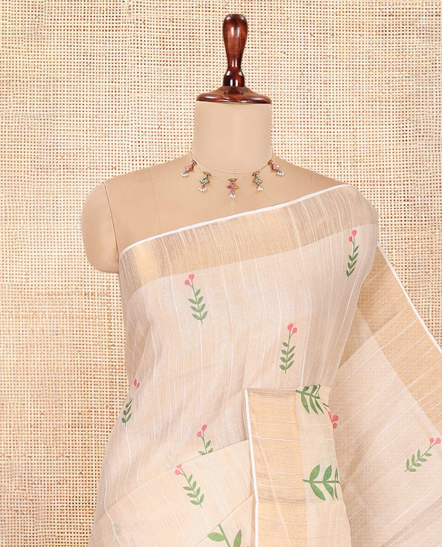 Cream-Pink Tissue Linen Cotton Saree Features Floral Buttas, a Zari Border, Floral Pallu, Matching Blouse