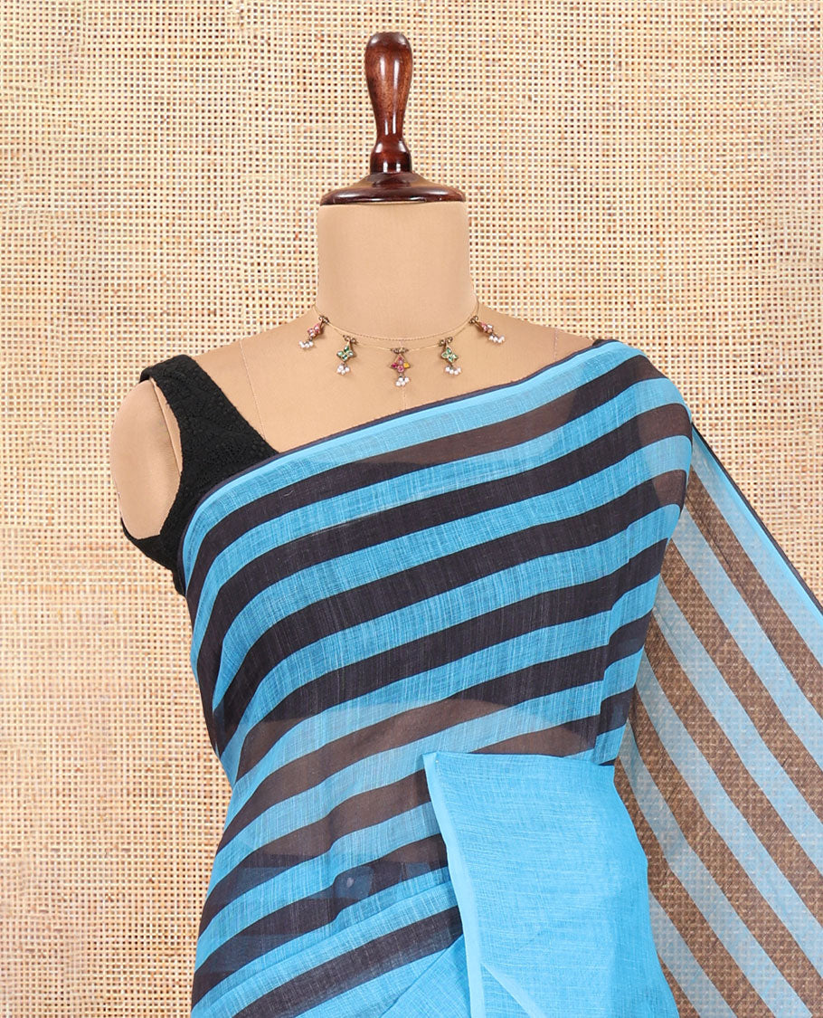 Borderless Blue Linen Cotton Saree, Ornamented with Stripes, a Self-Pallu of Stripes, and a Contrast Blouse