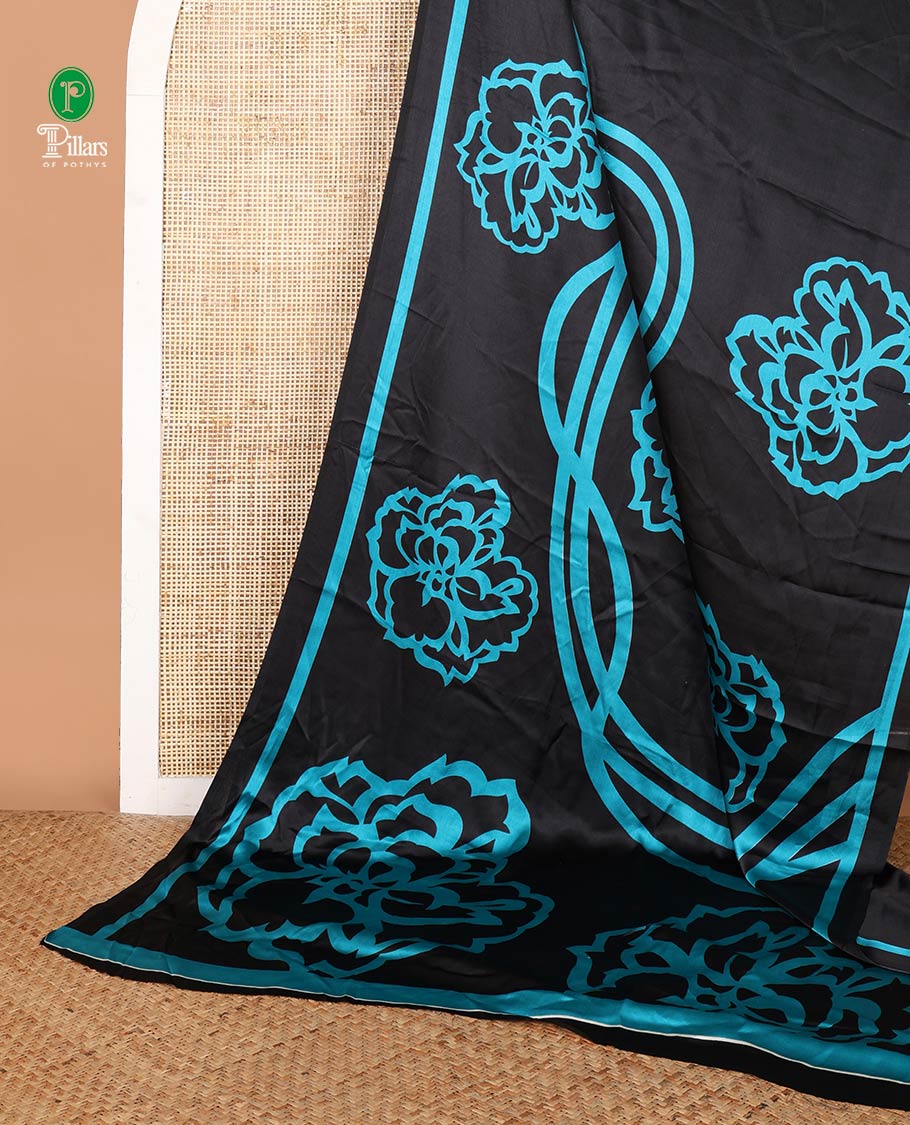 Bordeless black with blue printed design modal crepe saree & printed pallu along with plain blouse