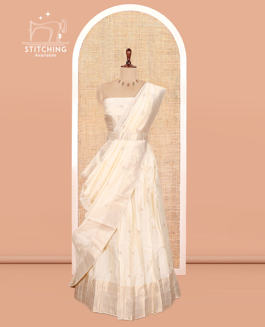 Cream Semi-Banarasi Half Saree, Zari Buttas Top, a Matching Blouse, and Intricately Designed Dhavani
