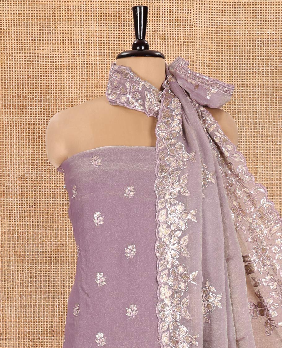 Lavender Material Churidar Set, Artfully Detailed with an Floral Motifs Embroidered on Its Nc Moss Organza Top, Plain Santoon Bottom, and Nc Moss Organza Scallop Dupatta of Floral-Leaf Embroidery