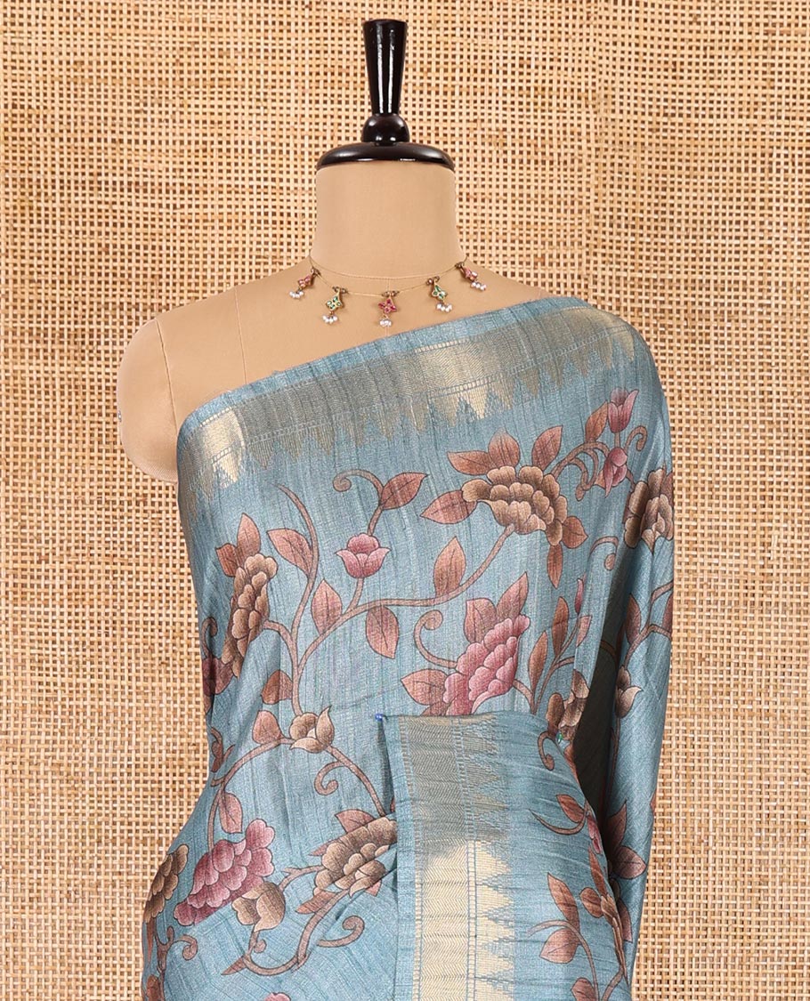 Blue floral vine printed fancy tussar saree, zari temple border, floral printed pallu, and a matching zari woven blouse