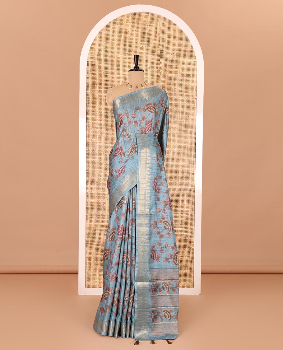 Blue floral vine printed fancy tussar saree, zari temple border, floral printed pallu, and a matching zari woven blouse