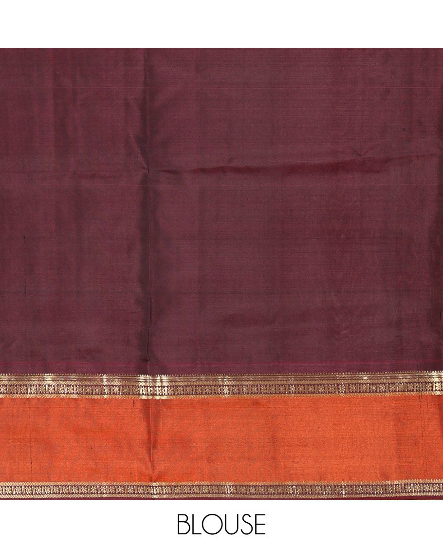 Mehendi Green Mayuri Soft Silk Saree Embellished with Medium-sized Zari Checks, Complemented by a Contrast Rettai Pettu Border of Rekku, Banaras, Kathir, and Star Vanki Designs, Pallu Elevated with Zari Designs, and Paired with a Contrast Blouse
