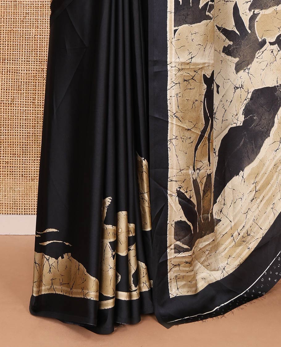 Black jungle-theme tree, animal, and human motifs batik printed satin crepe saree, printed border, printed pallu, and a matching blouse