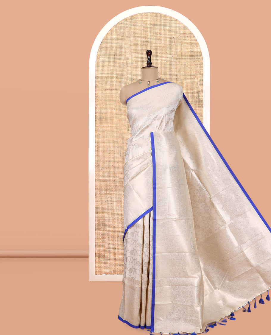 Off-White-M.s Blue Semi-Silk Saree, Adorned with Floral Jacquard Design, a Zari Paisley Border, and a Contrast Blouse