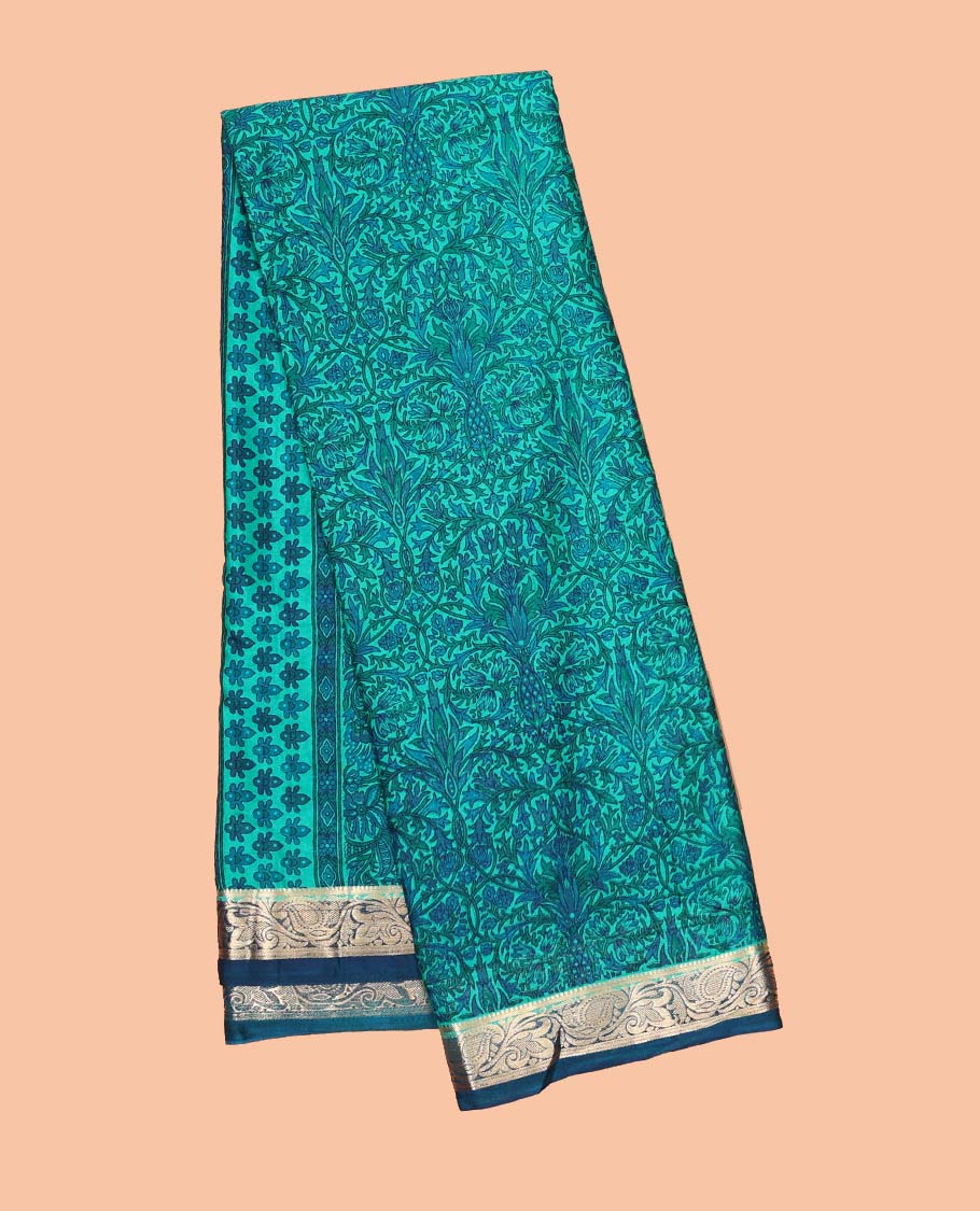Blue intricately printed semi-banaras printed saree, contrast floral & paisley border & floral design pallu
