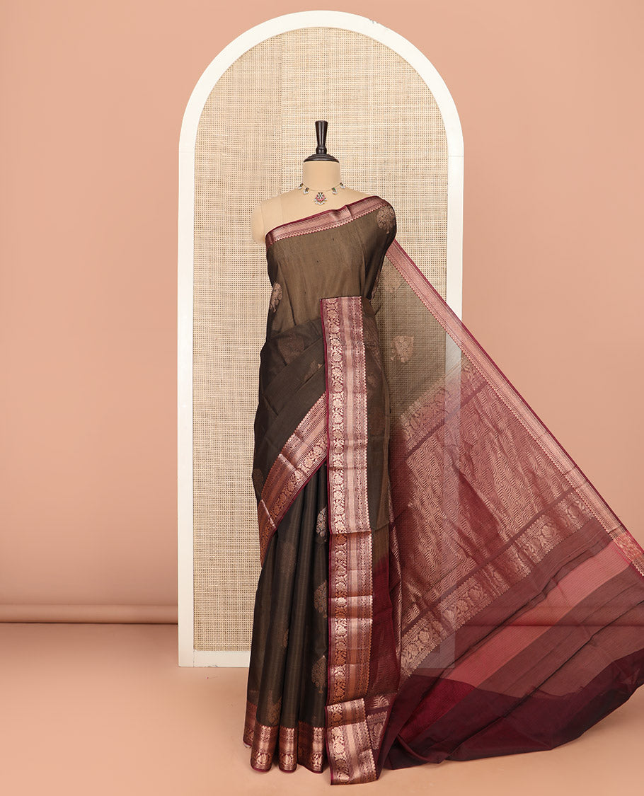 Brown Silk Cotton Saree Elevated with Zari Buttas All Over the Body, Highlighted with Contrast Traditional Zari Design Border, Pallu Featuring Geometric Designs, and Paired with a Contrast Blouse