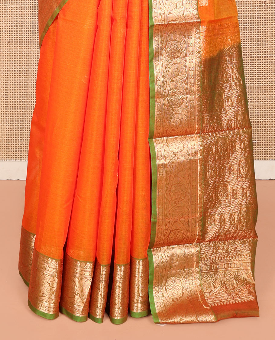 Orange Silk Cotton Saree, Enriched with Zari Buttas, Complemented by a Contrast Traditional Zari Border, Pallu of Intricate Designs, and a Matching Blouse