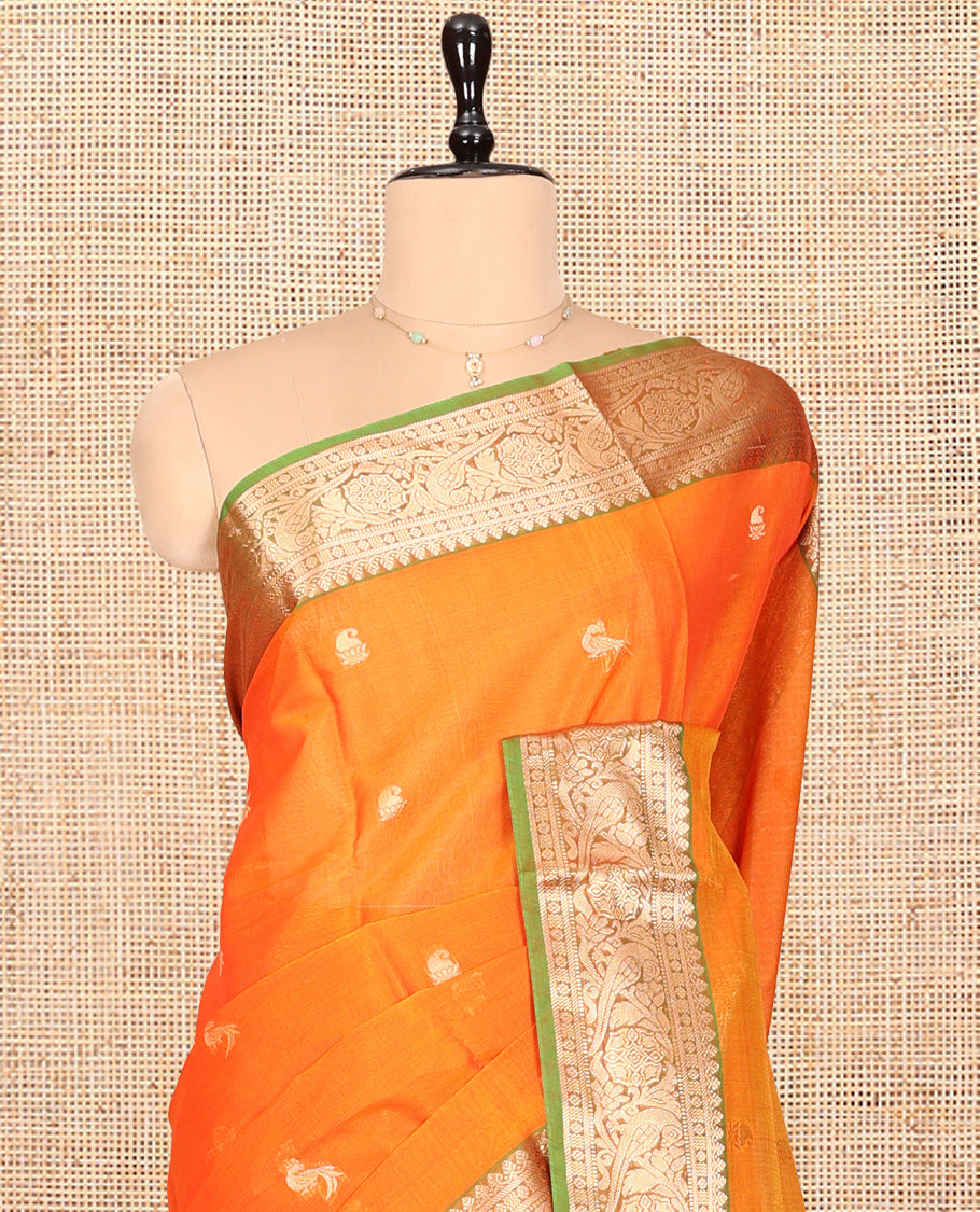 Orange Silk Cotton Saree, Enriched with Zari Buttas, Complemented by a Contrast Traditional Zari Border, Pallu of Intricate Designs, and a Matching Blouse