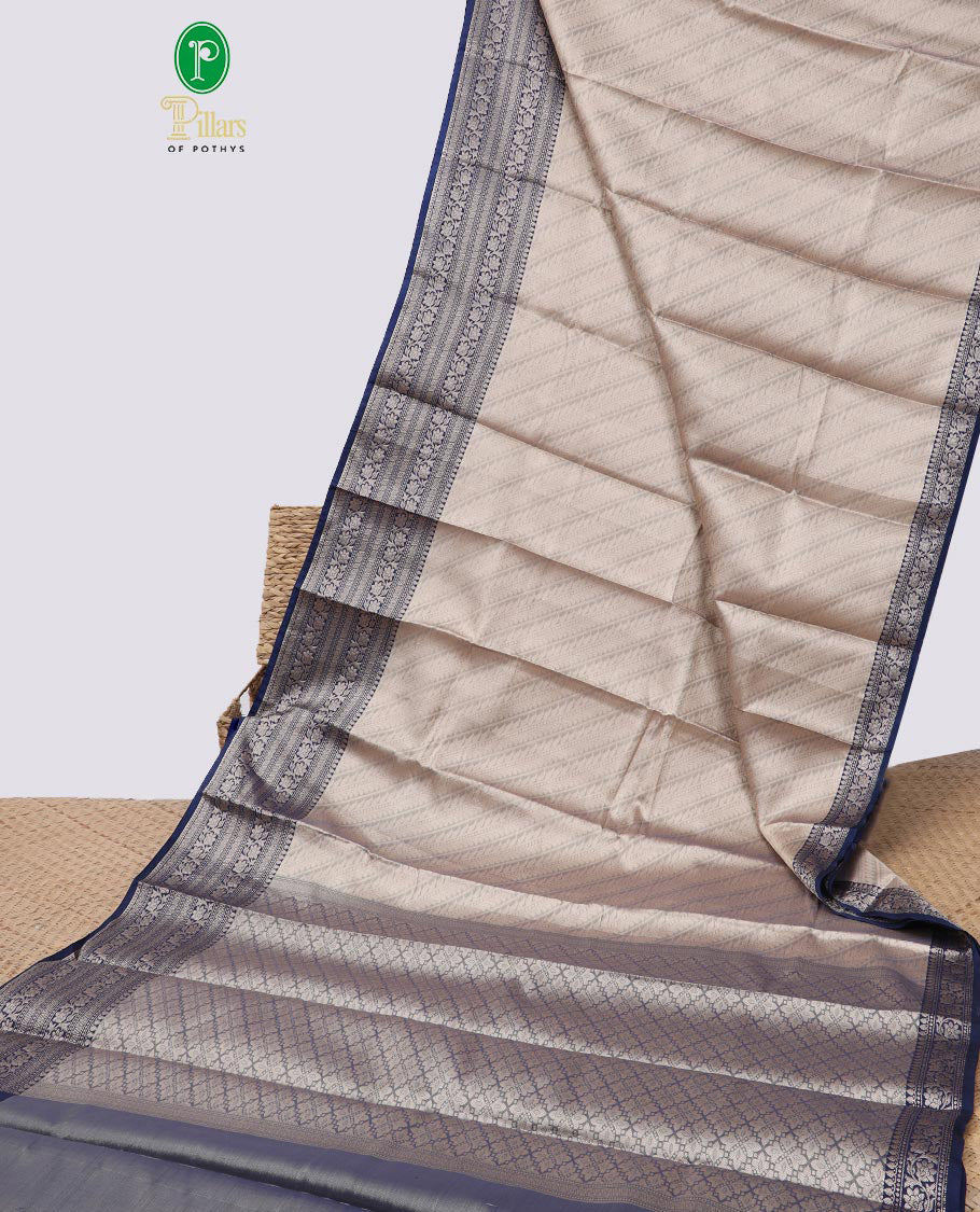 Grey striped floral semi tissue saree with contrast floral design border & zari design pallu