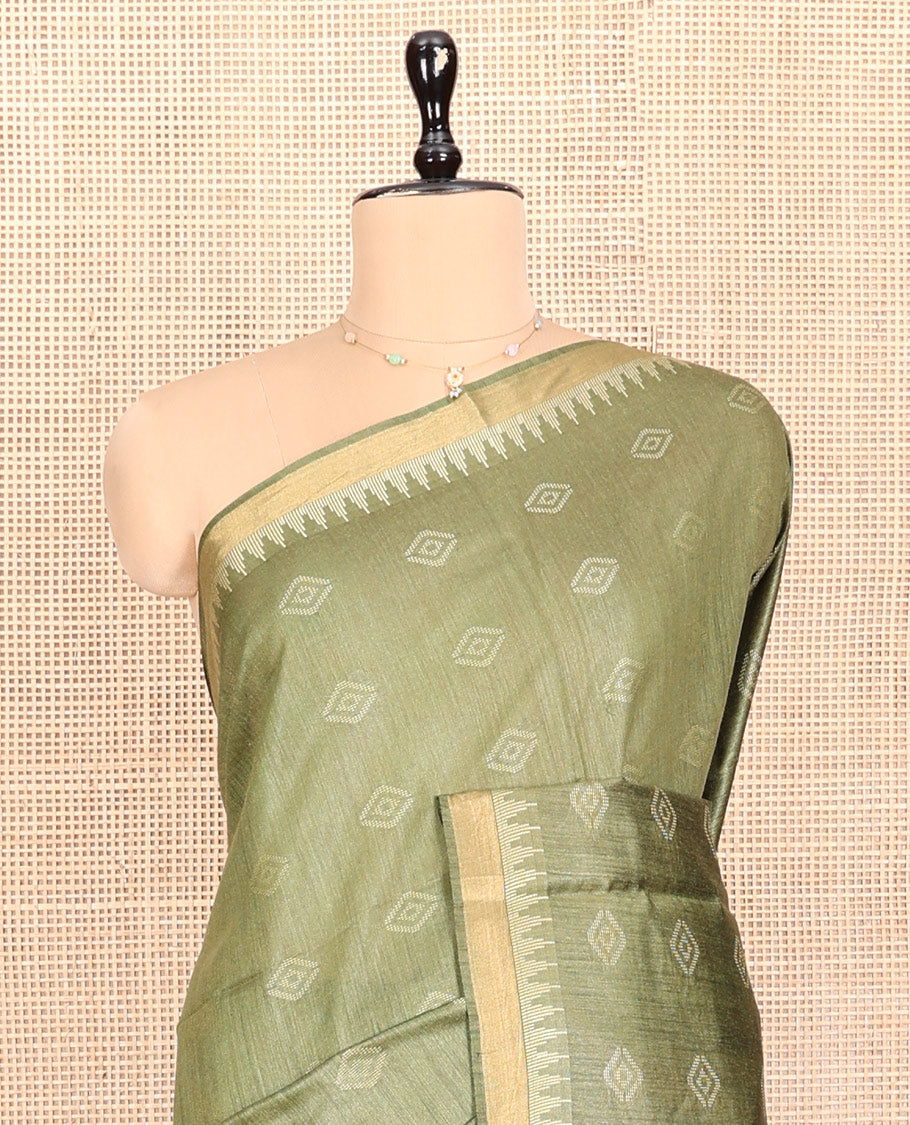 Green Tussar Silk Saree, Sparsely Woven with Buttas, a Subtle Temple Border, a Self-Pallu, and a Matching Blouse