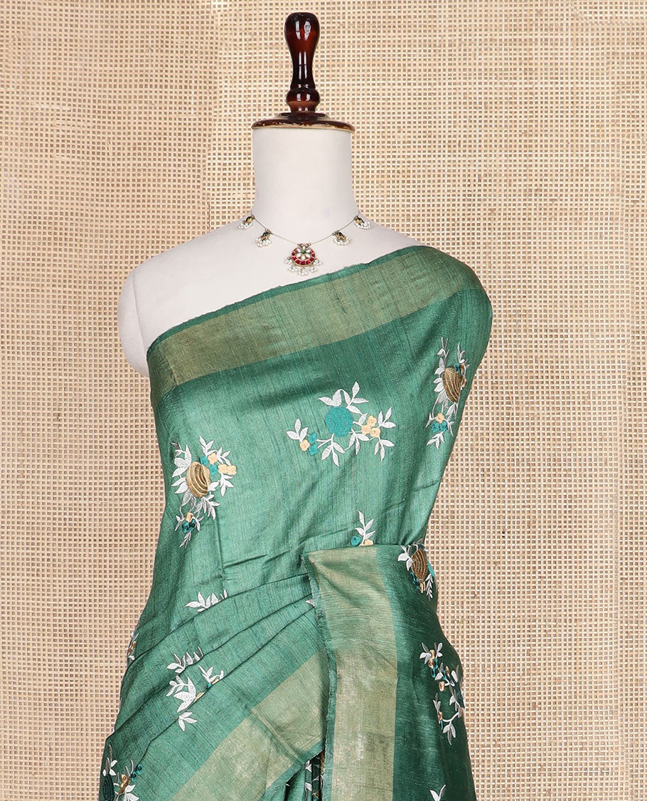 Green floral motifs multi-color thread embroidered tussar silk saree, bavanji border, and striped pallu