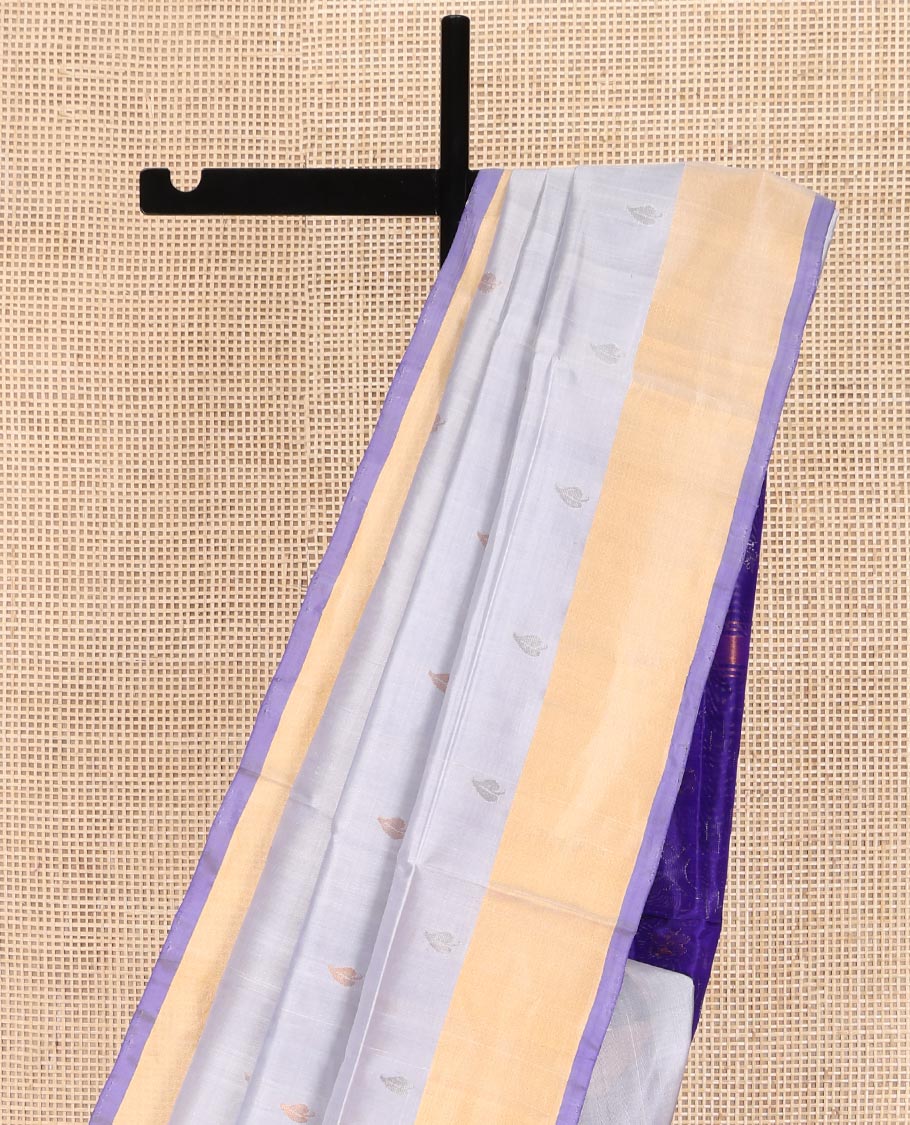 Grey Uppada Silk Saree, Sparsely Woven with Buttas All Over Its Body, Subtle Bavanji Border, Complemented by Contrast Pallu of Butta Enclosed Jaal Designs, and Paired with a Contrast Blouse