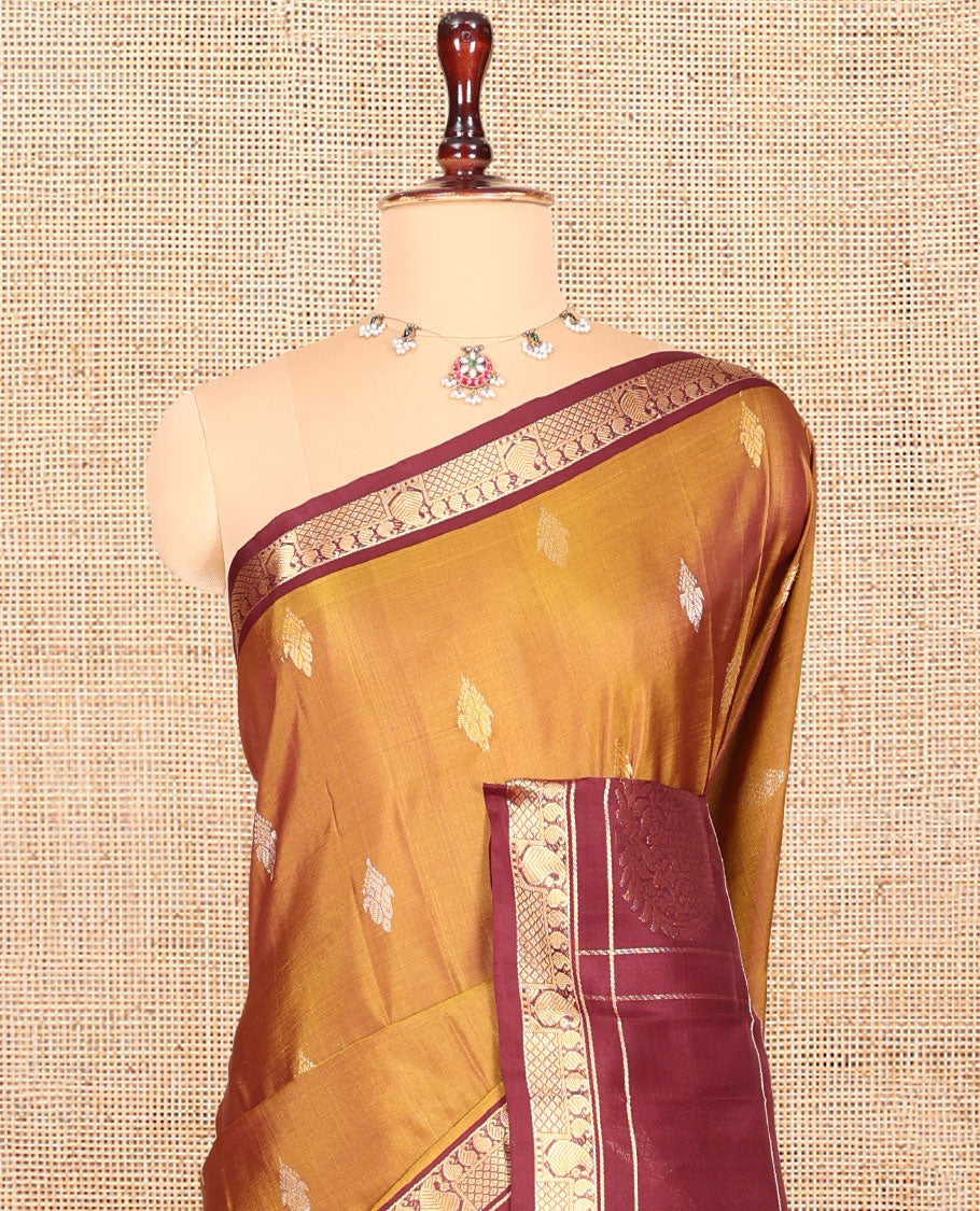 Mustard Uppada Silk Saree, Finely Crafted with Buttas, Complemented by a Contrast Traditional Zari Design Border, Floral-Paisley Pallu, and a Contrast Blouse