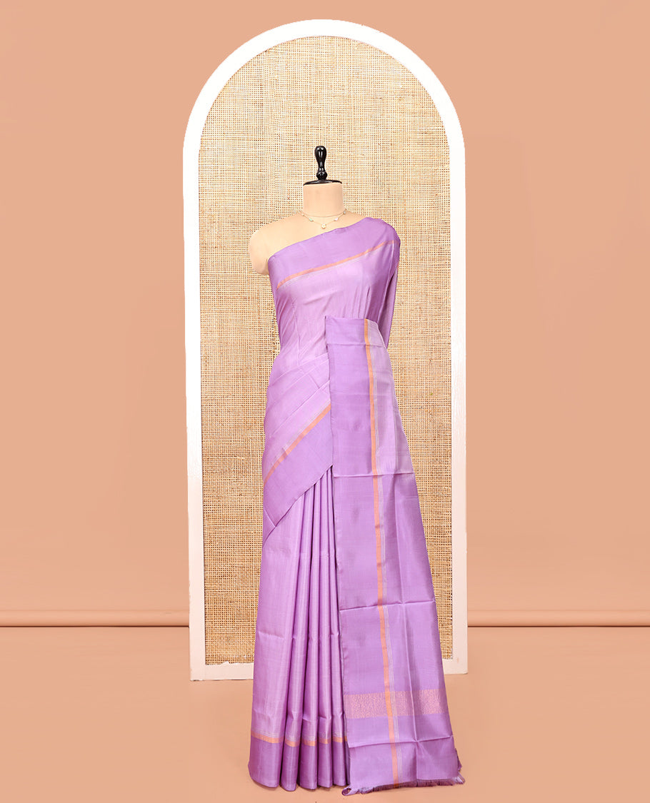 Lavender Plain Uppada Silk Saree, Complemented by a Plain Border, Zari Pallu, and a Matching Blouse