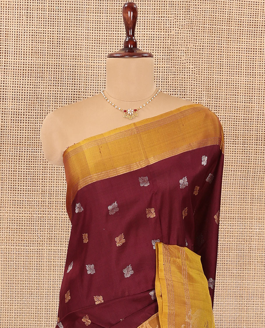 Maroon Uppada Silk Saree Ornamented with Zari Buttas, Complemented by a Contrast Zari Border of Bird Designs, Contrast Pallu of Scallop Designs, and Paired with a Contrast Blouse