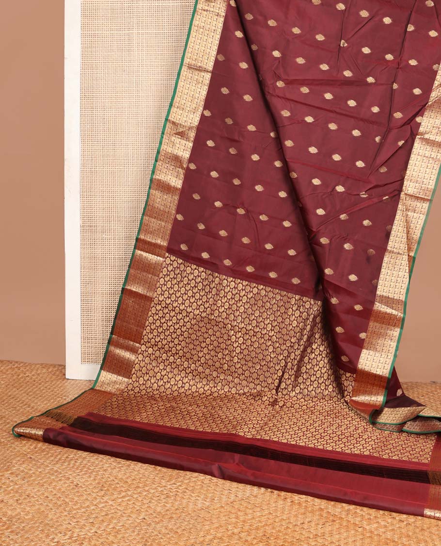 Maroon zari buttas Vasundhara silk mix saree, zari border of rekku & mayil designs & pallu steeped with mayil chakram designs