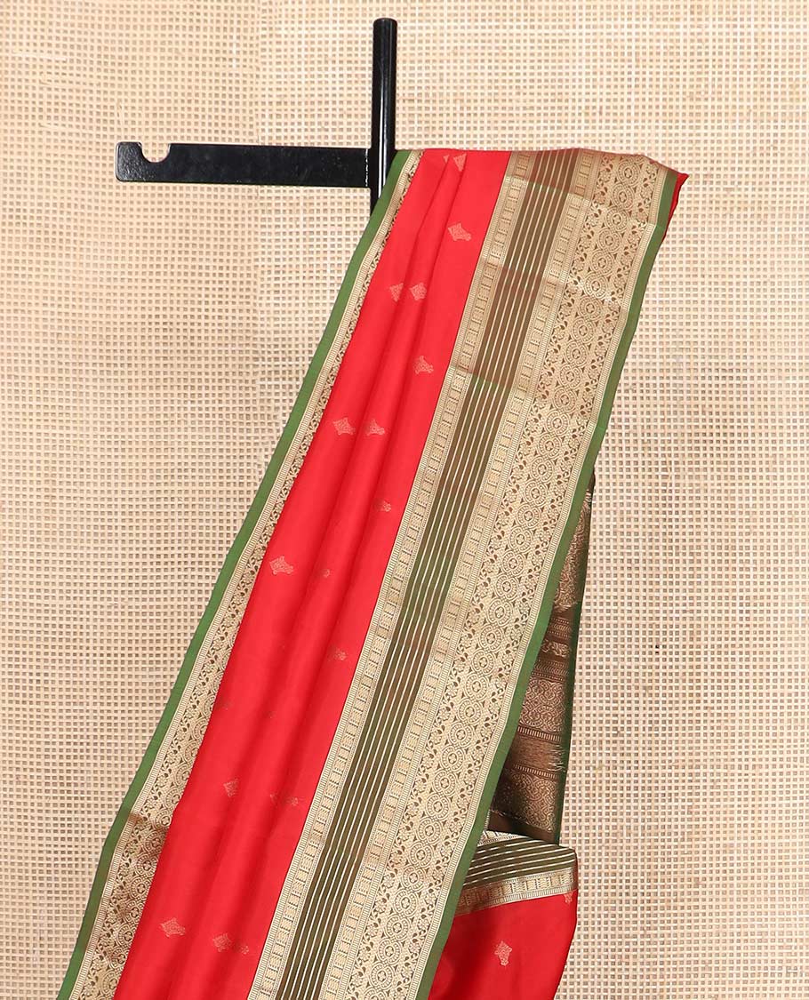 Red zari buttas Vasundhara silk mix saree, contrast border of muthu, banaras, kodi visiry, and chakram designs, and pallu of manga designs