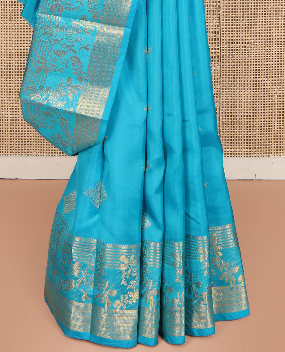 Blue Vasundhara Lite Silk Mix Saree, Artfully Detailed with Zari Buttas on Its Body, Highlighted by Zari Temple Border of Floral Designs, Gracefully Embellished Pallu of Jaal Designs, and Paired with a Matching Blouse