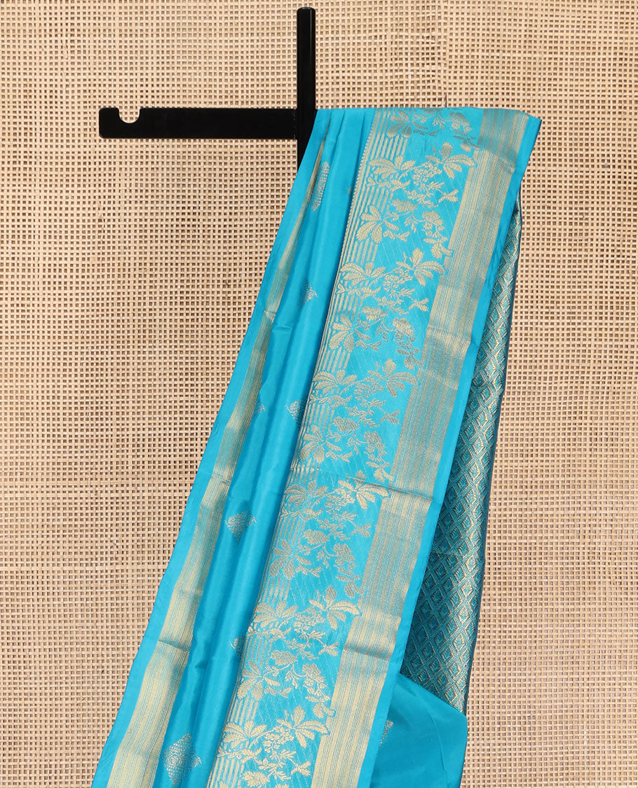 Blue Vasundhara Lite Silk Mix Saree, Artfully Detailed with Zari Buttas on Its Body, Highlighted by Zari Temple Border of Floral Designs, Gracefully Embellished Pallu of Jaal Designs, and Paired with a Matching Blouse