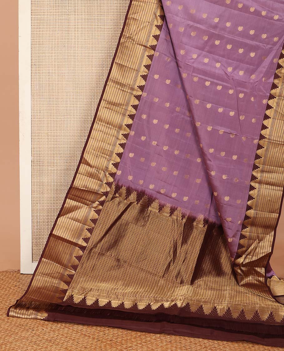 Purple manga buttas Vasundhara silk mix saree, contrast thazampoo rekku border of geometric designs, and geometric patterned pallu