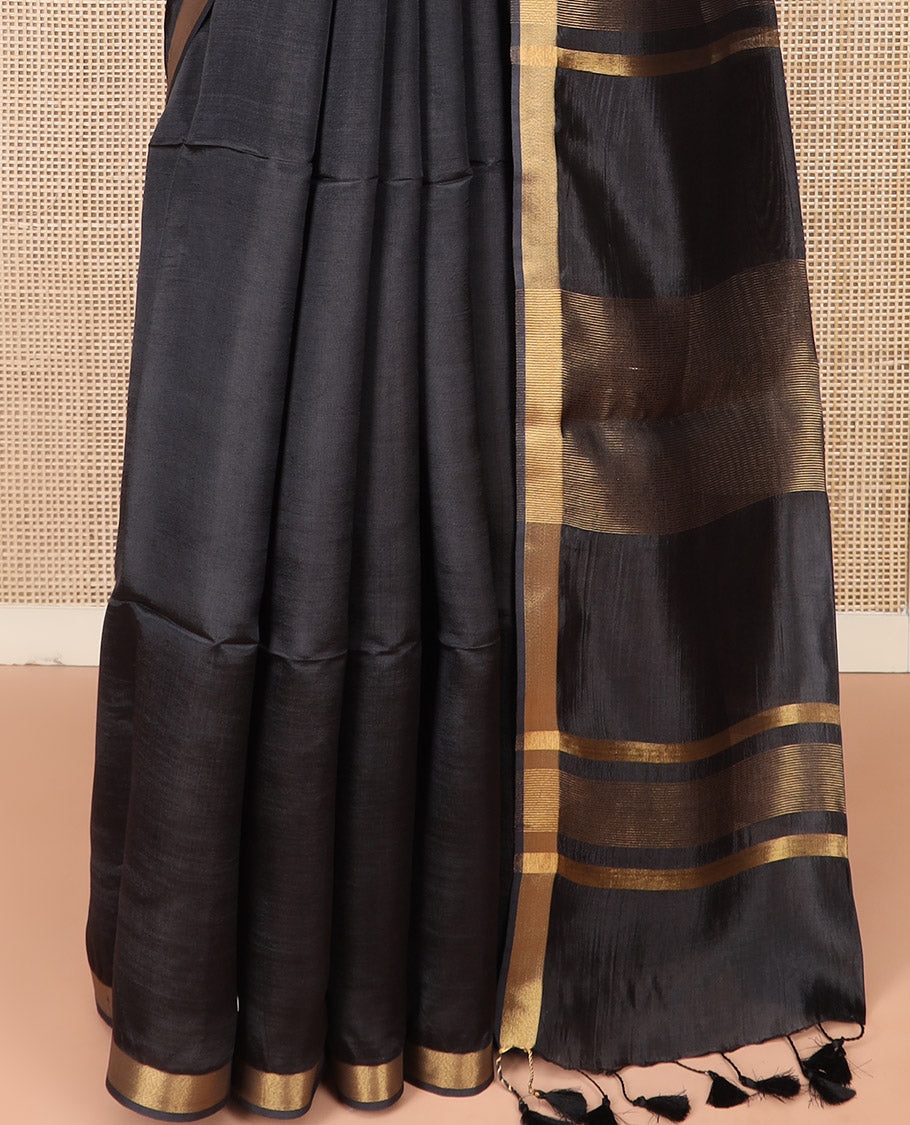Black Plain Banana Pith Saree Subtly Sparkled with Zari Bavanji Border, Gleaming Zari Stripes Woven Pallu, and Paired with a Matching Plain Blouse