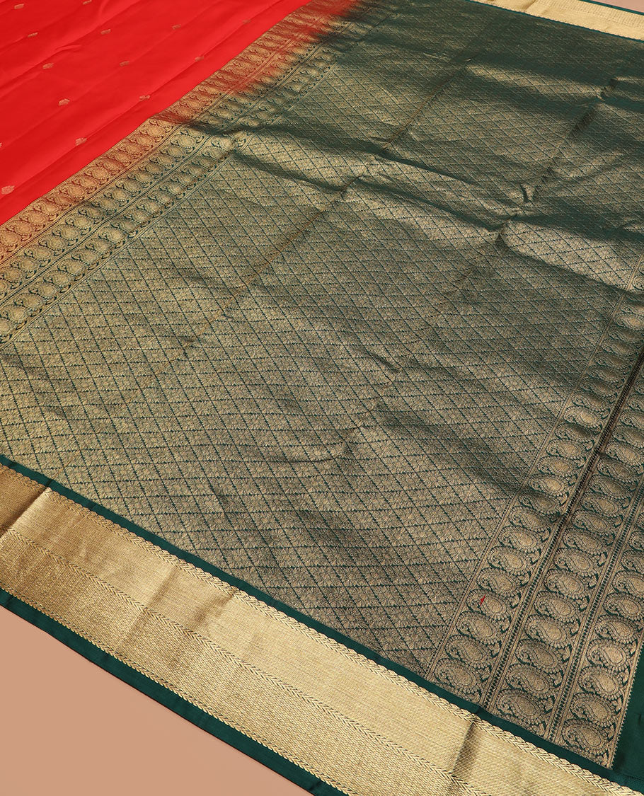 Red zari buttas silk saree, contrast border of thilakam mokku, kathir, and mayil kann, and jaal pallu
