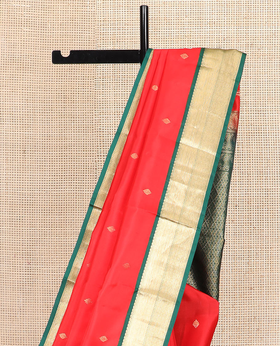 Red zari buttas silk saree, contrast border of thilakam mokku, kathir, and mayil kann, and jaal pallu