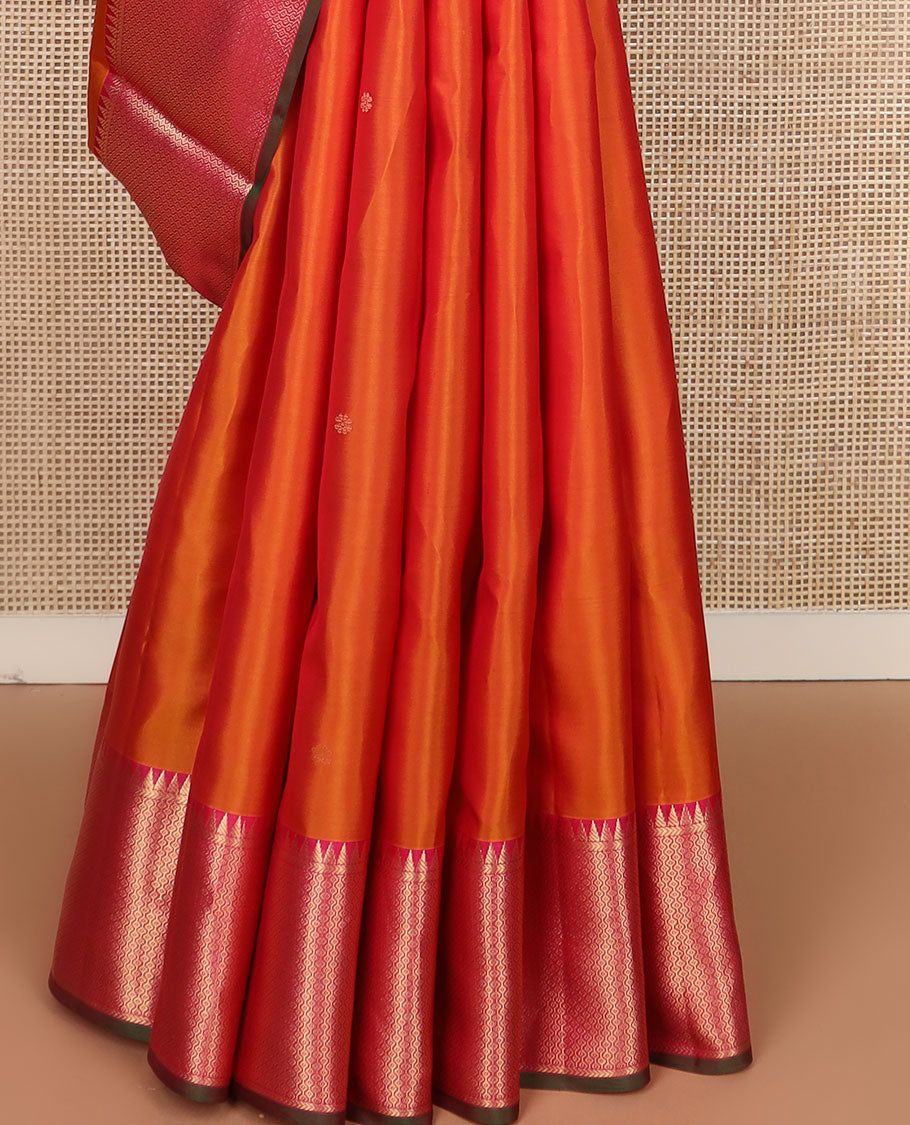 Orange zari buttas silk saree, contrast border of rekku & then kuli kann designs & pallu woven with Annam chakram & jaal design