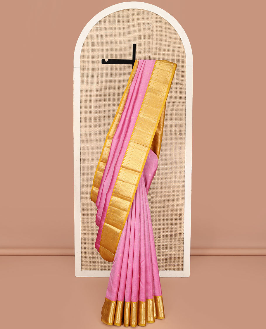 Pink Vasundhara Silk Saree, Subtly Sparkled with Zari Buttas and Checks All Over Its Body, Complemented by a Contrast Border of Rekku, Rudraksham, and Then Kuli Kann Designs, Grand Jaal Pallu, and Paired with a Contrast Blouse