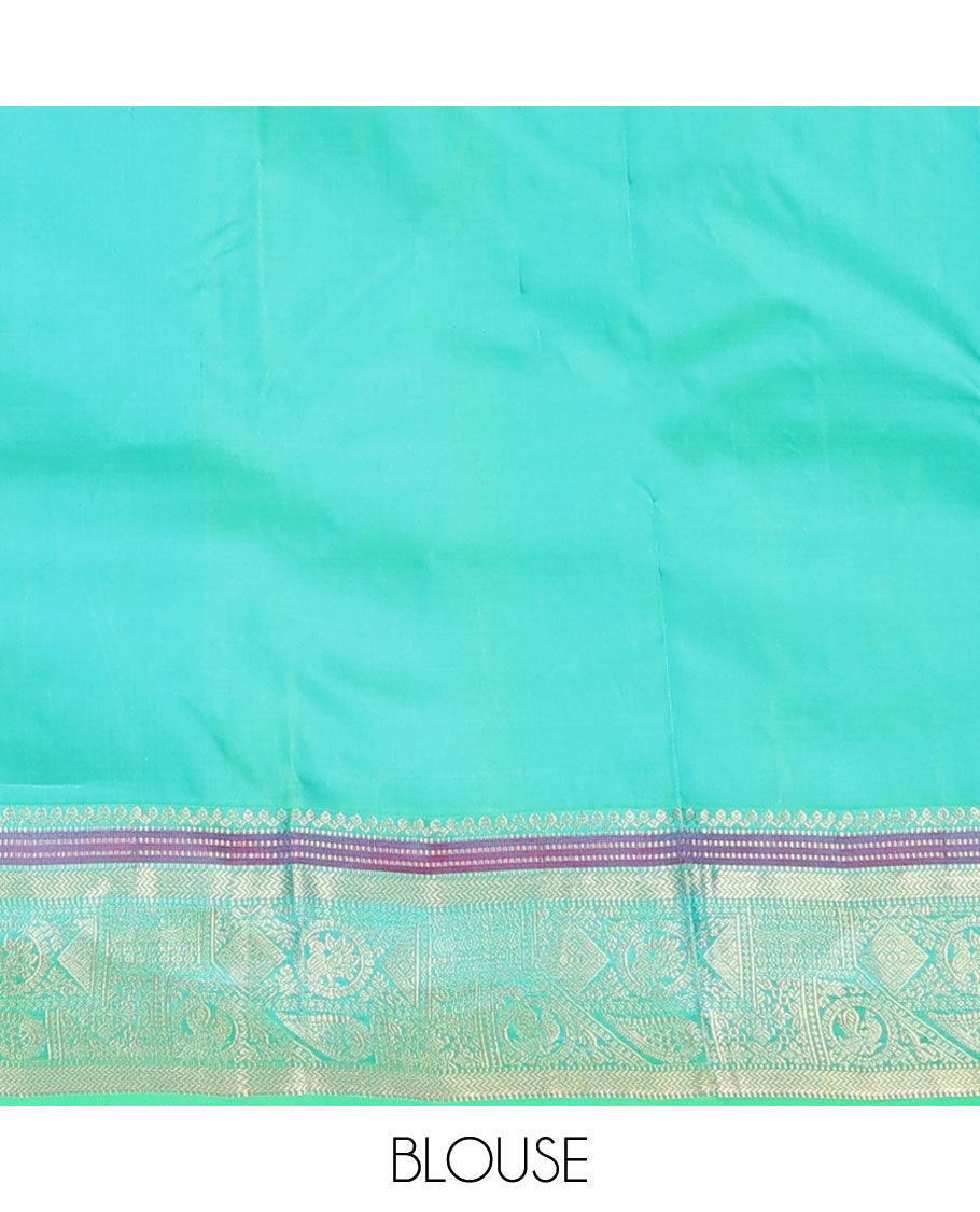 Brown zari buttas silksaree, contrast floral pallu & zari border of salngai,muthu,vanki & round mayil designs