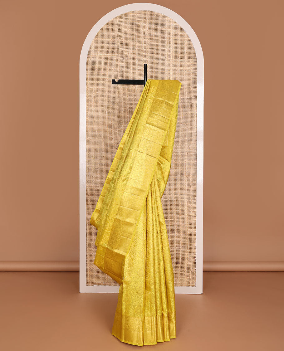 Yellow jacquard wedding silk saree, self-border of rekku,kodi visiry & mayil kann & jaal pallu