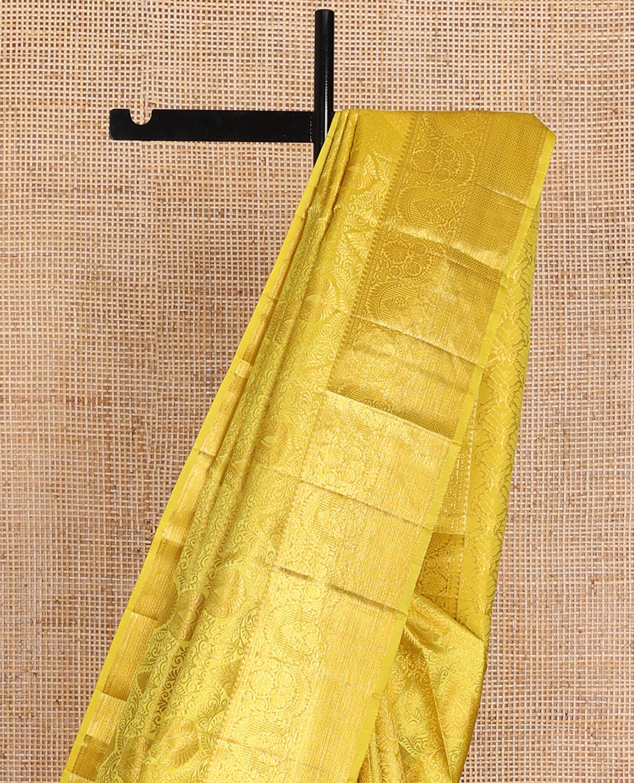 Yellow jacquard wedding silk saree, self-border of rekku,kodi visiry & mayil kann & jaal pallu