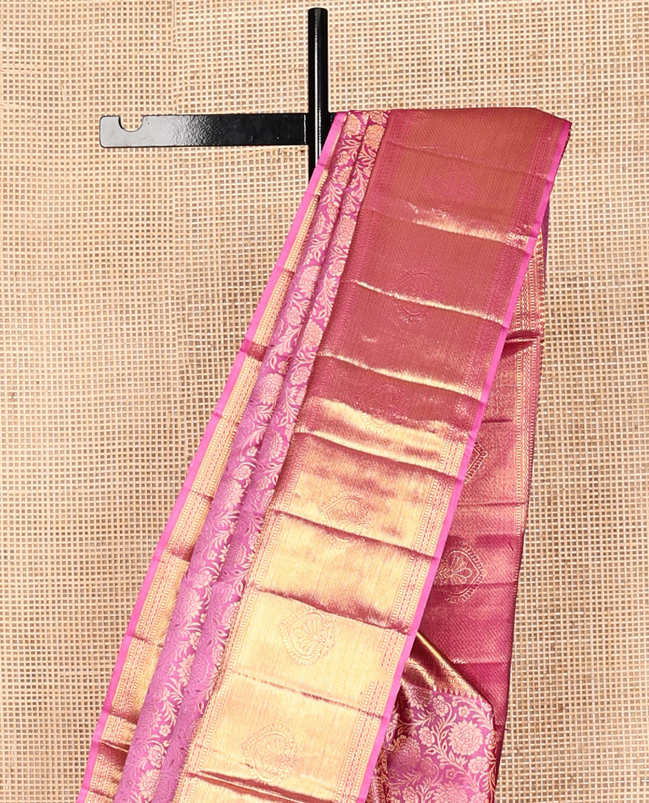 Pink Kanchipuram Wedding Silk Saree, Spotlighted with Jacquard Design, a Traditional Zari Border, a Grand Jaal Pallu, and a Matching Blouse