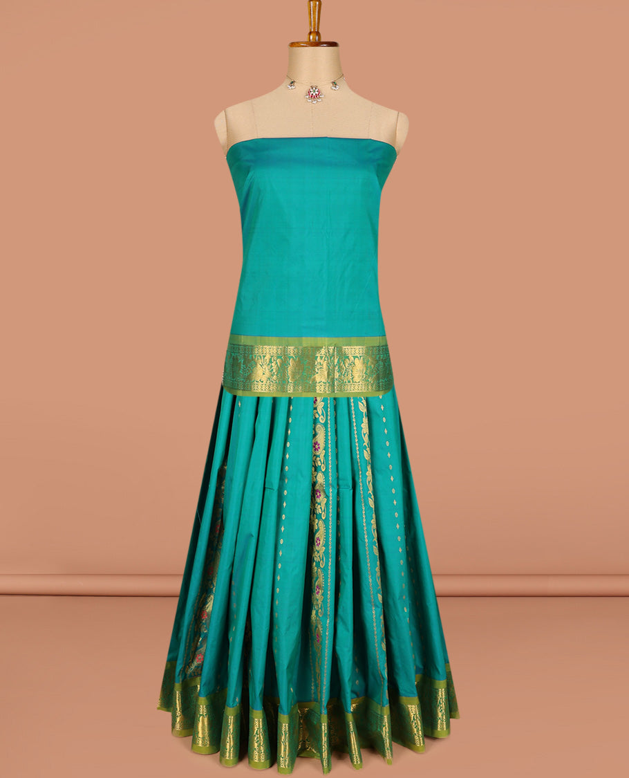 Green art silk half-saree pavadai material, zari design with contrast traditional bordered skirt, matching blouse, and zari design dhavani