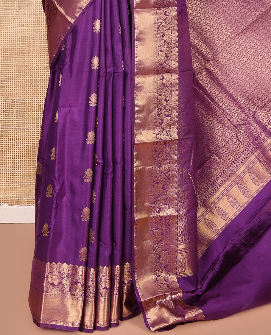 Purple Budget Silk Saree Detailed with Zari Buttas All Over Its Body, Highlighted by a Zari Traditional Border of Floral Creeper Designs, Grand Pallu of Scallop Designs, and Paired with a Matching Blouse