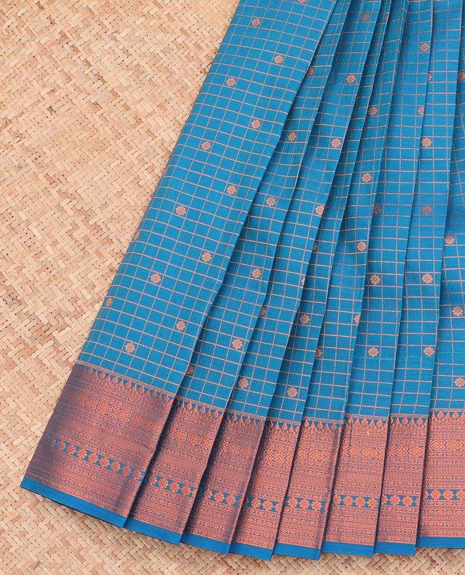 Blue Budget Silk Saree, Detailed with Zari Buttas and Checks All Over Its Body, Highlighted by a Traditional Zari Design Border, Grand Pallu, and Paired with a Matching Blouse