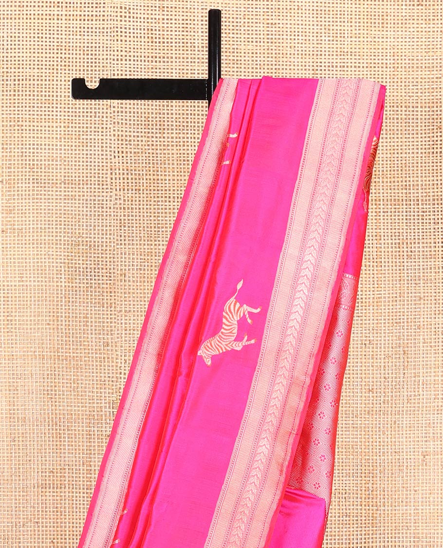 Pink Banarasi Silk Saree Accentuated with Zebra Motifs All Over Its Body, a Subtle Border of Traditional Designs, Pallu Decked Up with Floral and Diamond Designs, and Paired with a Matching Blouse