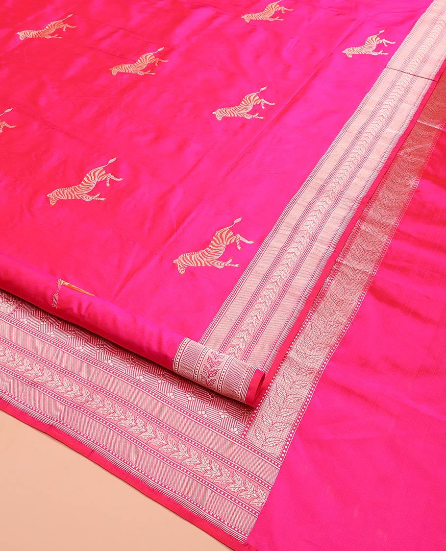 Pink Banarasi Silk Saree Accentuated with Zebra Motifs All Over Its Body, a Subtle Border of Traditional Designs, Pallu Decked Up with Floral and Diamond Designs, and Paired with a Matching Blouse