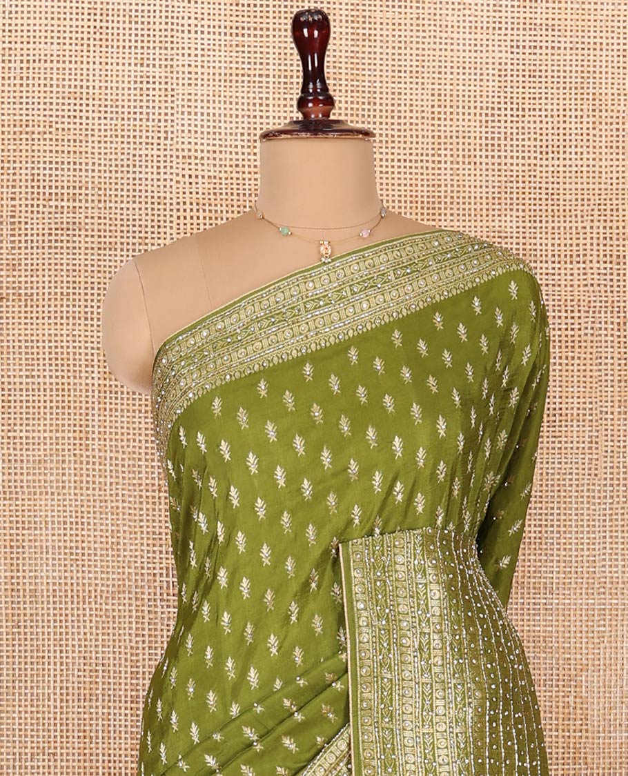 Green Dola Silk Saree, Adorned with Buttas on Its Body, Highlighted by Embroidered-Zari Work Border, Pallu of Embroidery and Zari Work, and Paired with a Matching Blouse
