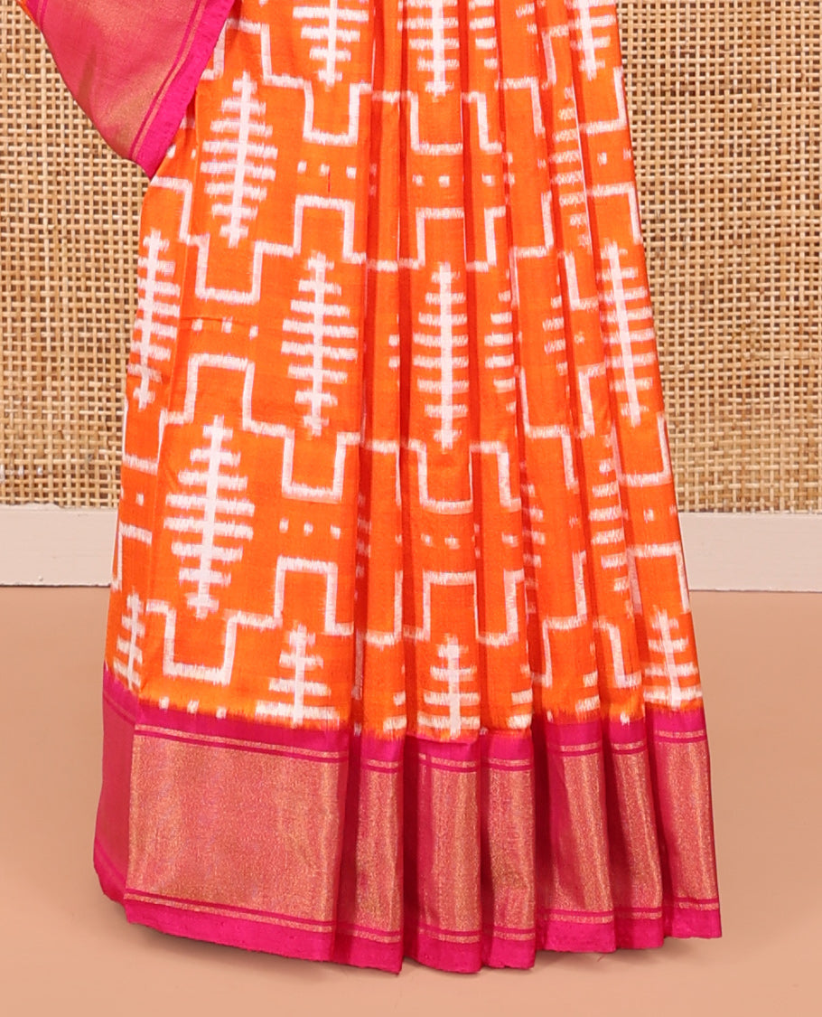 Orange Ikkat Silk Saree, Mesmerized with Ikkat-Style Geometric Patterns on Its Body, Complemented by a Contrast Border, Pallu Features Chevron Stripes, and Paired with a Contrast Blouse