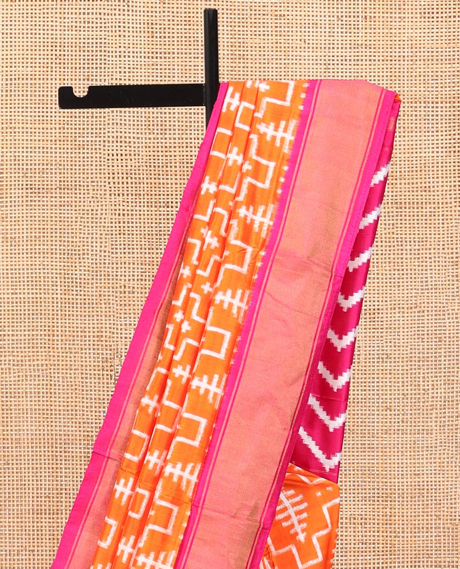 Orange Ikkat Silk Saree, Mesmerized with Ikkat-Style Geometric Patterns on Its Body, Complemented by a Contrast Border, Pallu Features Chevron Stripes, and Paired with a Contrast Blouse